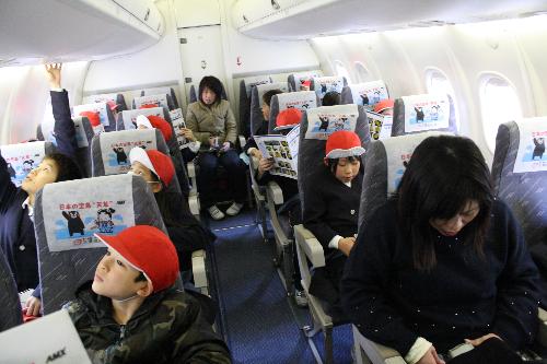 飛行機中６
